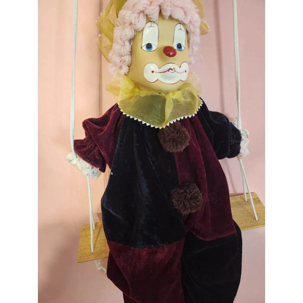 Vintage Clown Doll Sits On Wooden Swing Ceramic Head